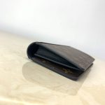 louis-vuitton-brazza-wallet-monogram-macassar-canvas-small-leather-goods-M69410_PM1_Side-view-1.webp