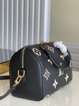 louis-vuitton-speedy-bandouliere-25-bicolor-monogram-empreinte-leather-handbags-M58947_PM2_Front-view-1.png
