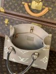 louis-vuitton-onthego-pm-bicolor-monogram-empreinte-leather-handbags-M45779_PM2_Front-view.png