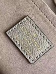 louis-vuitton-bagatelle-bicolor-monogram-empreinte-leather-handbags-M46112_PM2_Front-view.png