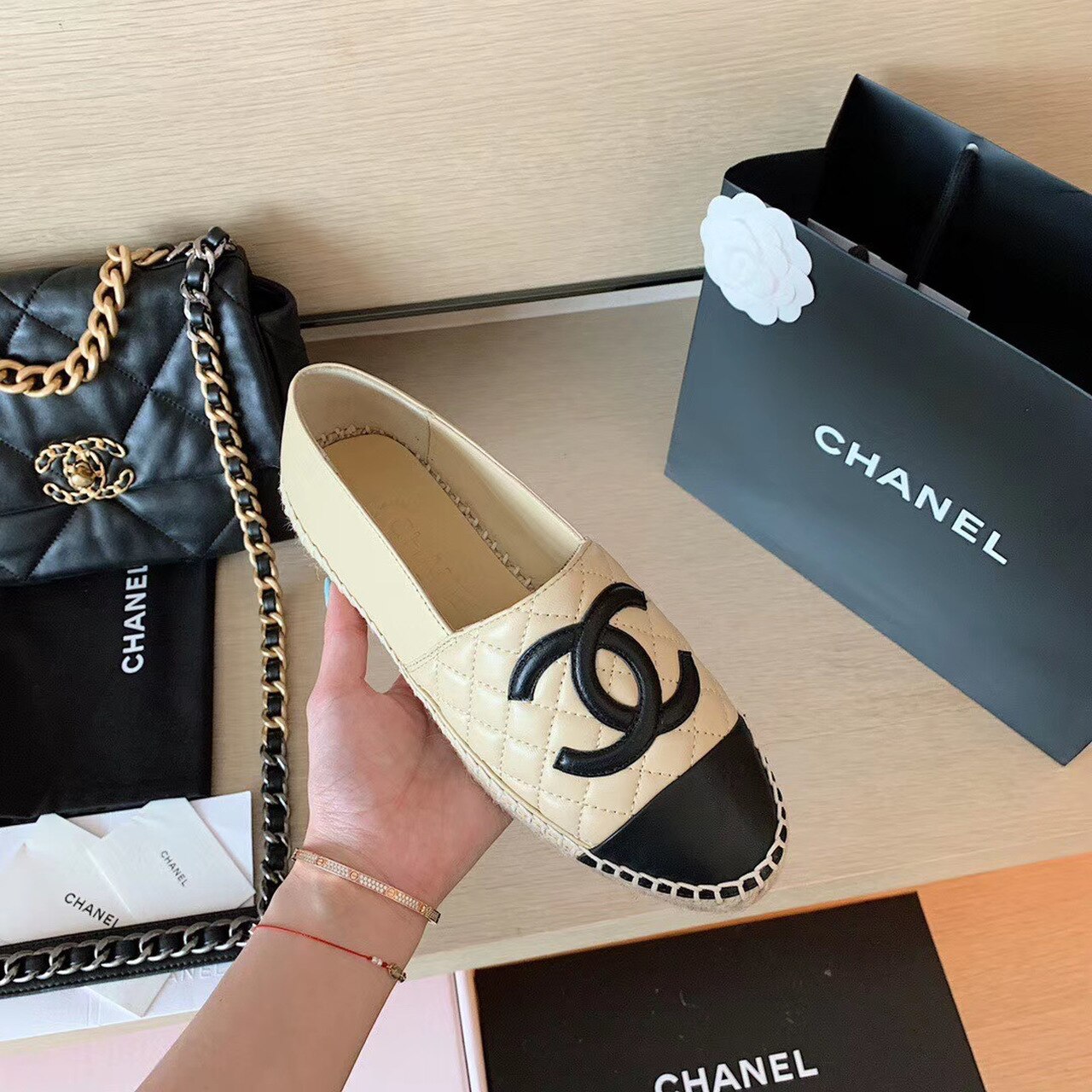 CHANEL BEIGEBLACK ESPADRILLES