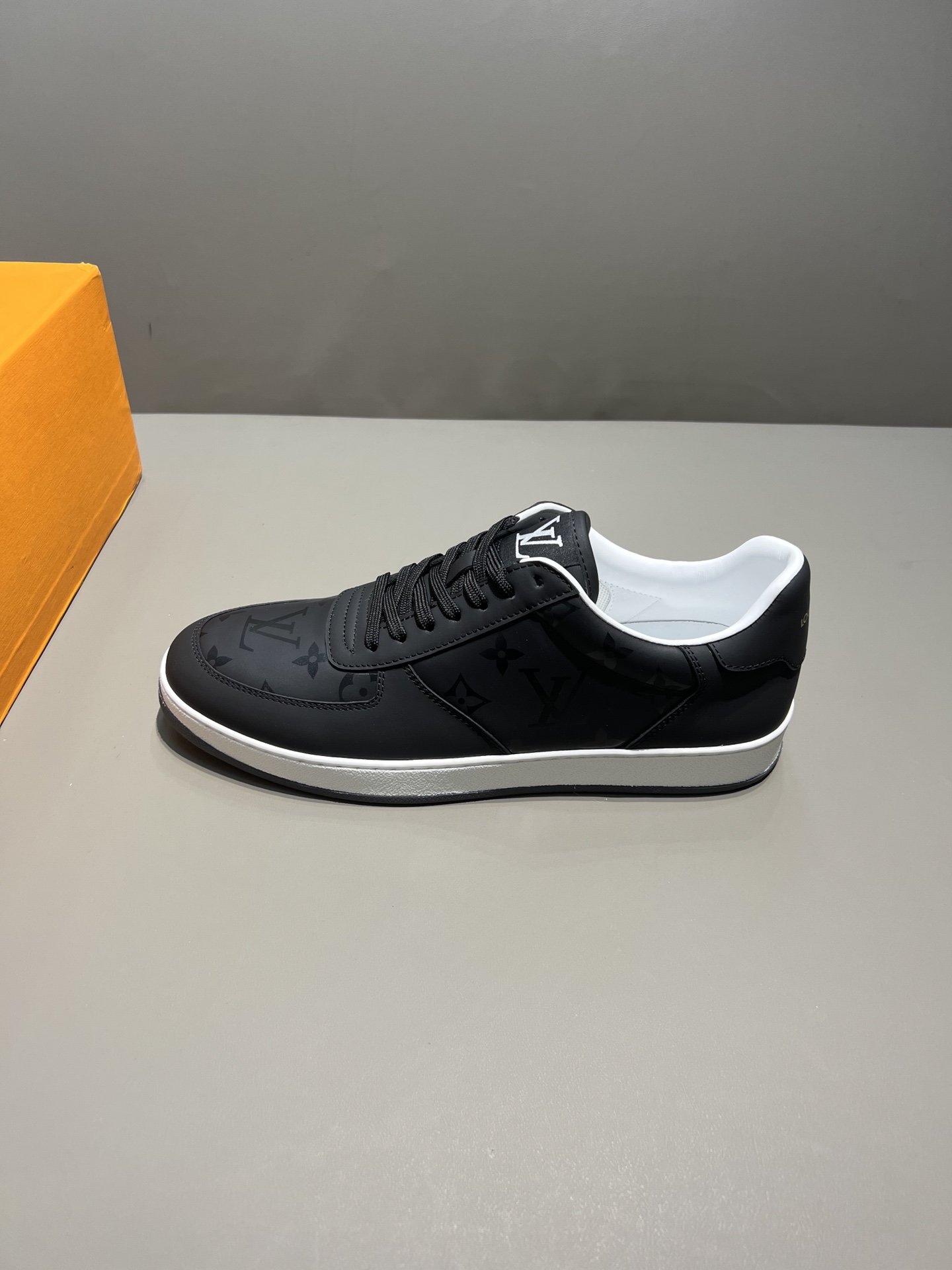 LOUIS VUITTON RIVOLI SNEAKER MONOGRAM METALLIC CANVAS BLACK