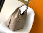 LOUIS-VUITTON-Mahina-Carmel-Hobo-Galet-1.jpg
