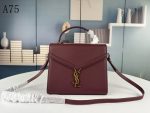 SAINT LAURENT CASSANDRA MEDIUM TOP HANDLE IN GRAIN DE POUDRE EMBOSSED DARK PECAN