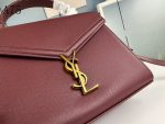 SAINT LAURENT CASSANDRA MEDIUM TOP HANDLE IN GRAIN DE POUDRE EMBOSSED DARK PECAN