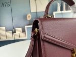 SAINT LAURENT CASSANDRA MEDIUM TOP HANDLE IN GRAIN DE POUDRE EMBOSSED DARK PECAN